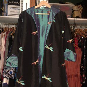 Reversible iridescent black silk evening coat